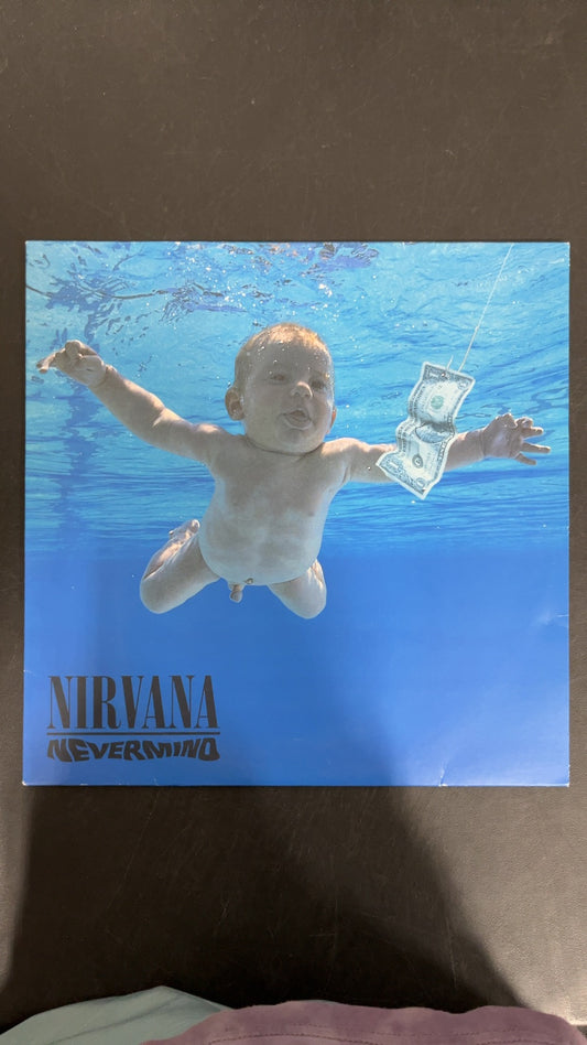 FRONT - Nirvana - Nevermind LE 180gm Metallic Silver Vinyl USED NOT TESTED