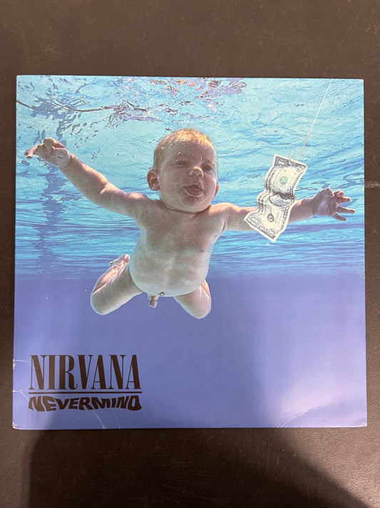 FRONT - Nirvana - Nevermind LE 180gm Metallic Silver Vinyl USED NOT TESTED