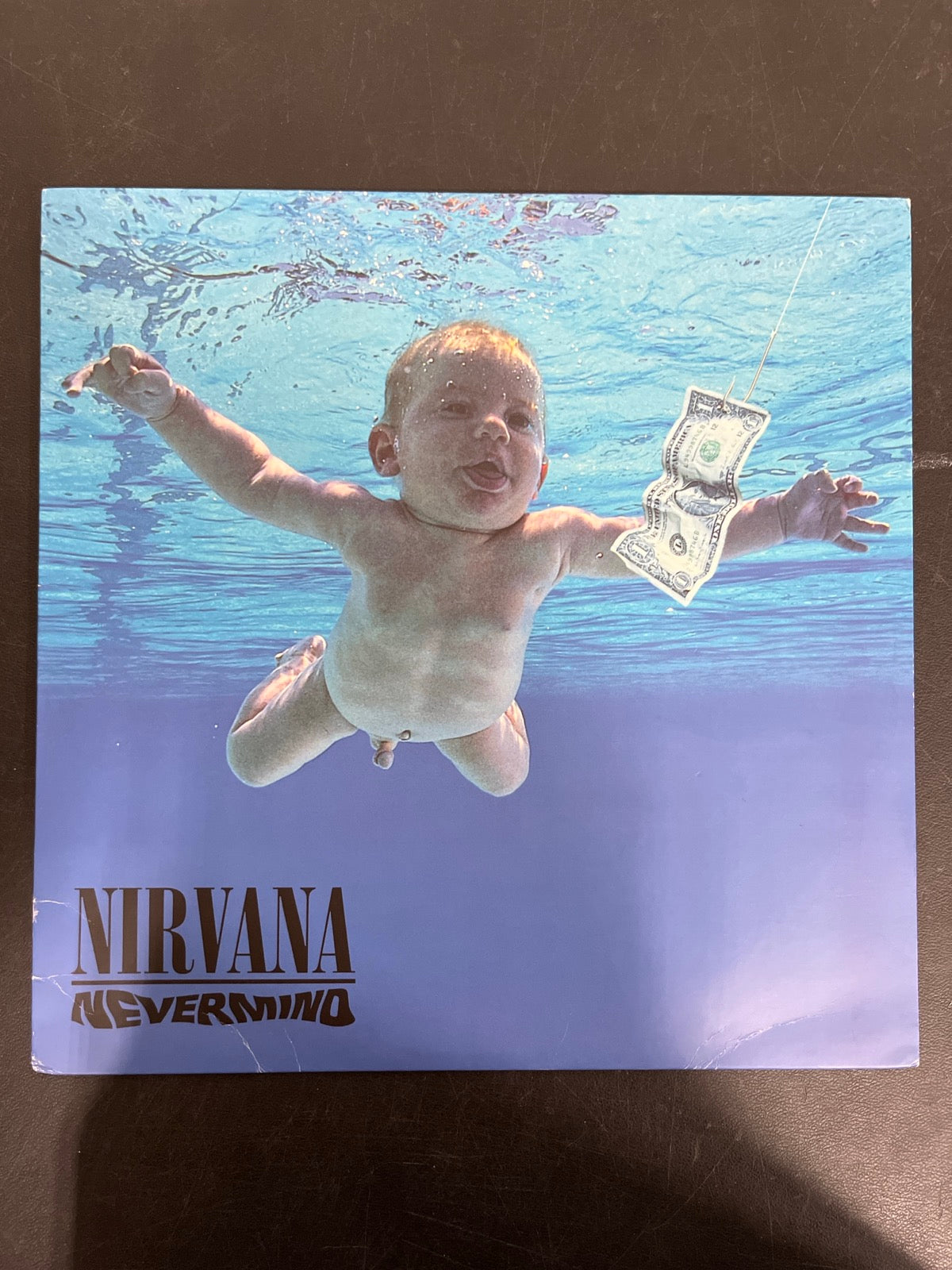 FRONT - Nirvana - Nevermind LE 180gm Metallic Silver Vinyl USED NOT TESTED