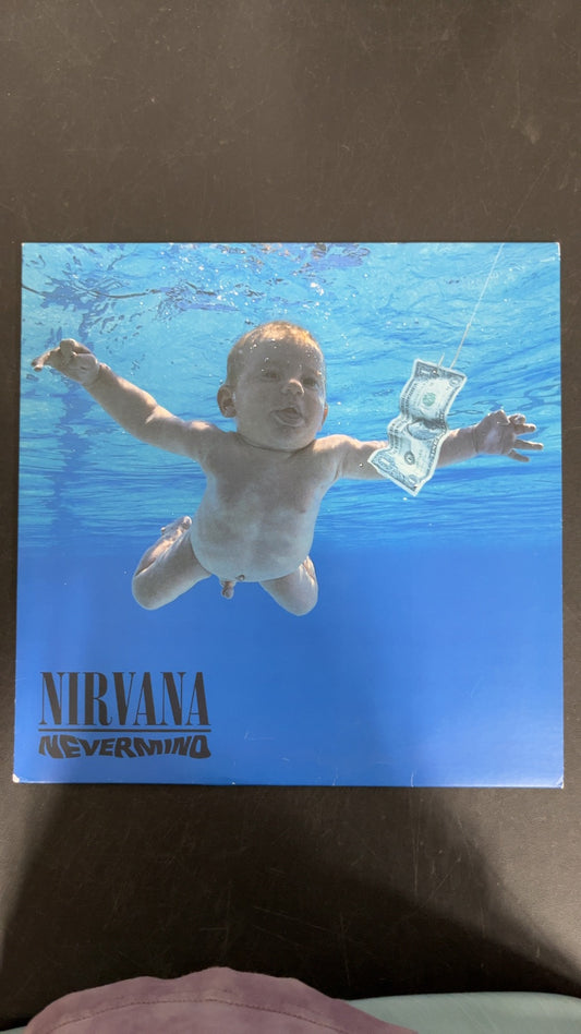 FRONT - Nirvana - Nevermind LE 180gm Metallic Silver Vinyl USED NOT TESTED