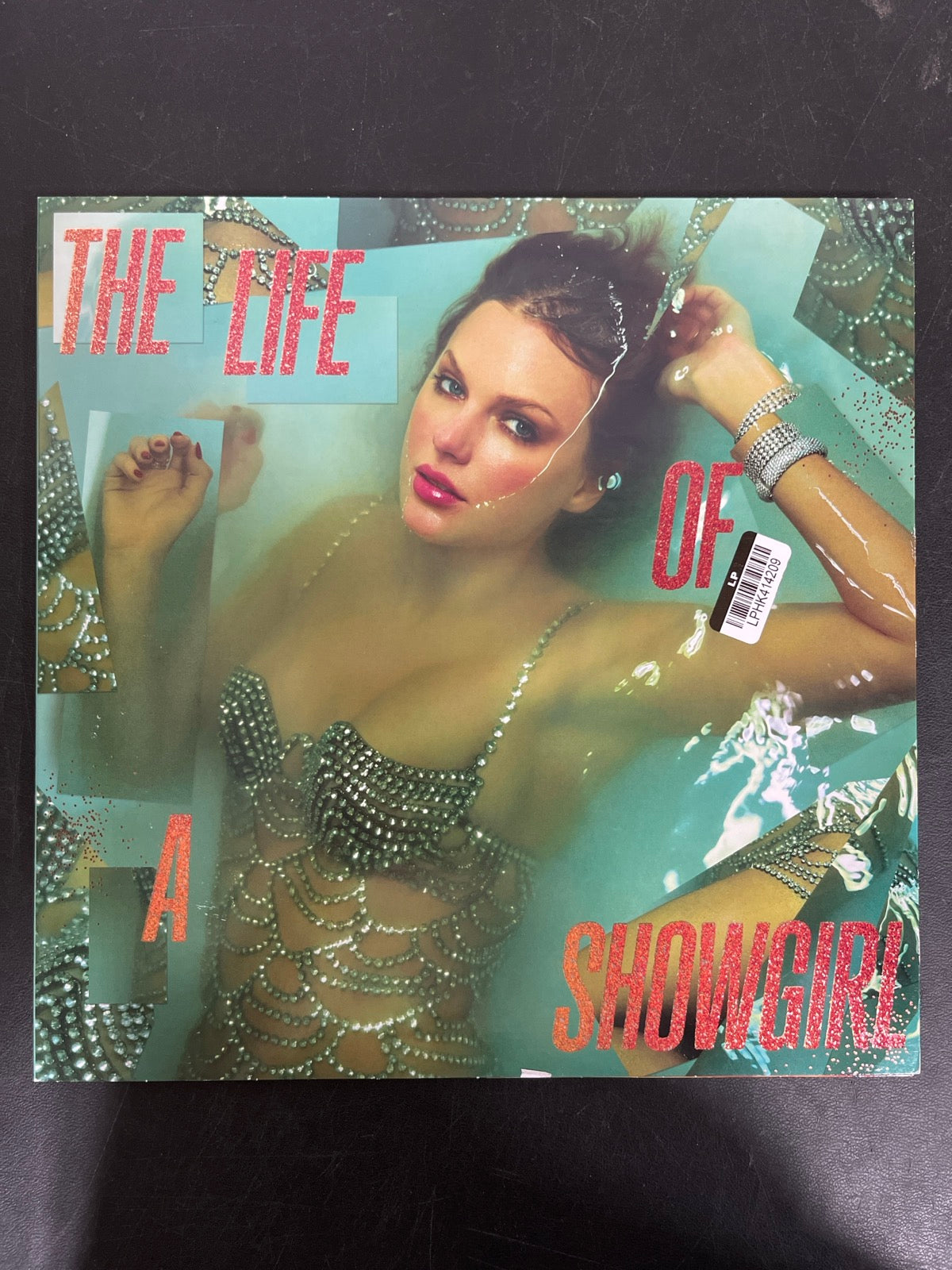 FRONT - Taylor Swift - The Life Of A... LE Orange Glitter Vinyl USED NOT TESTED