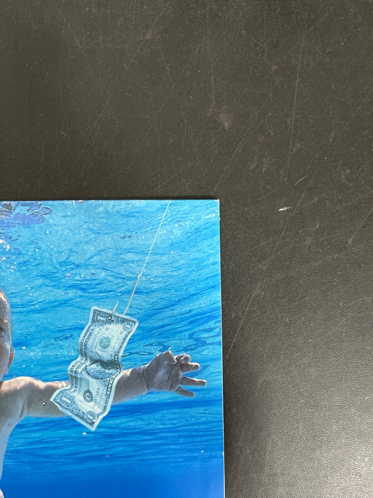 FRONT_TR - Nirvana - Nevermind LE 180gm Metallic Silver Vinyl USED NOT TESTED