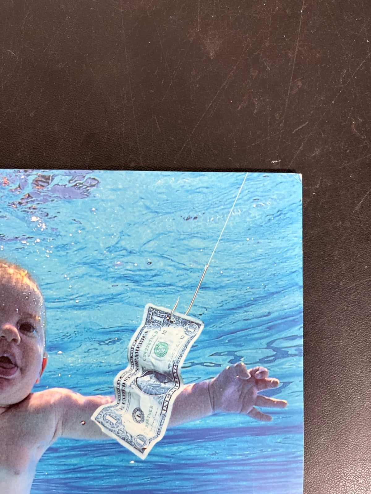 FRONT_TR - Nirvana - Nevermind LE 180gm Metallic Silver Vinyl USED NOT TESTED