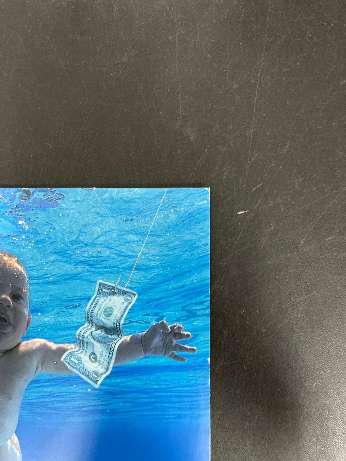 FRONT_TR - Nirvana - Nevermind LE 180gm Metallic Silver Vinyl USED NOT TESTED