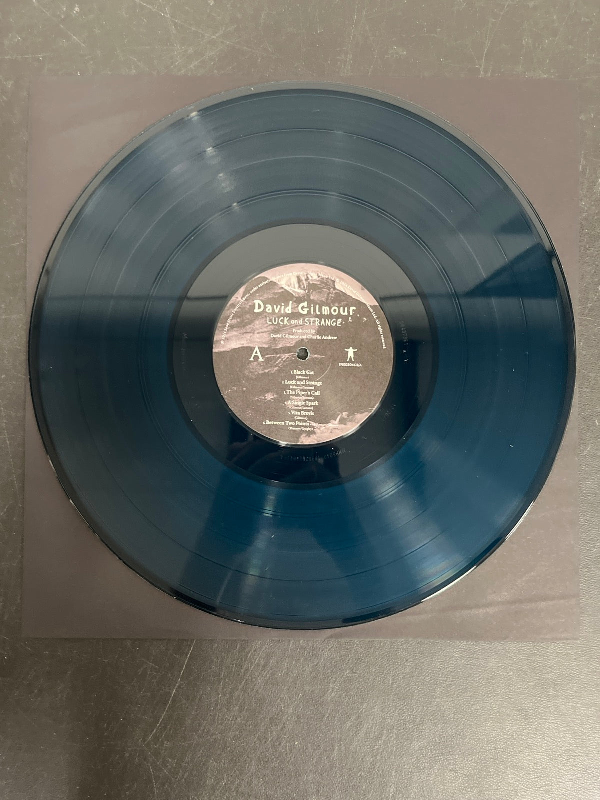 VINYL_1A - David Gilmour - Luck and S... Target Exclusive Blue Vinyl USED NOT TESTED